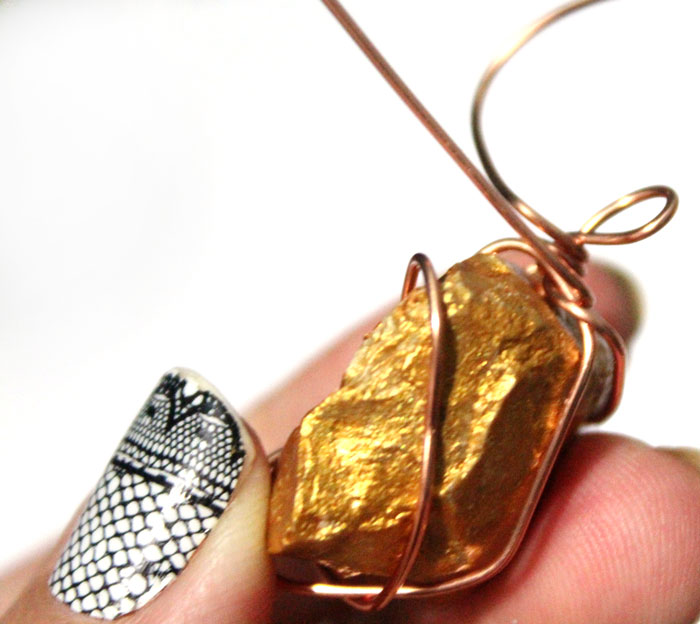 This DIY gold nugget jewelry is so easy to make and one of the cheapest jewelry making tutorials I've seen! Such an easy rock craft and teaches basic wire wrapping to make the pendants. The earrings take literally five minutes.