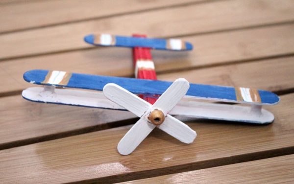 Make this super fun airplane craft - it works as a DIY wooden toy airplane too! I made it for my toddler but big kids can make it too :) It's an adorable flight and travel themed craft for kids