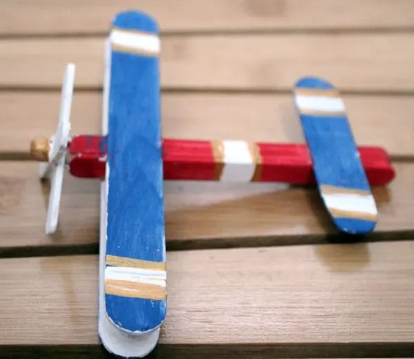 Make this super fun airplane craft - it works as a DIY wooden toy airplane too! I made it for my toddler but big kids can make it too :) It's an adorable flight and travel themed craft for kids