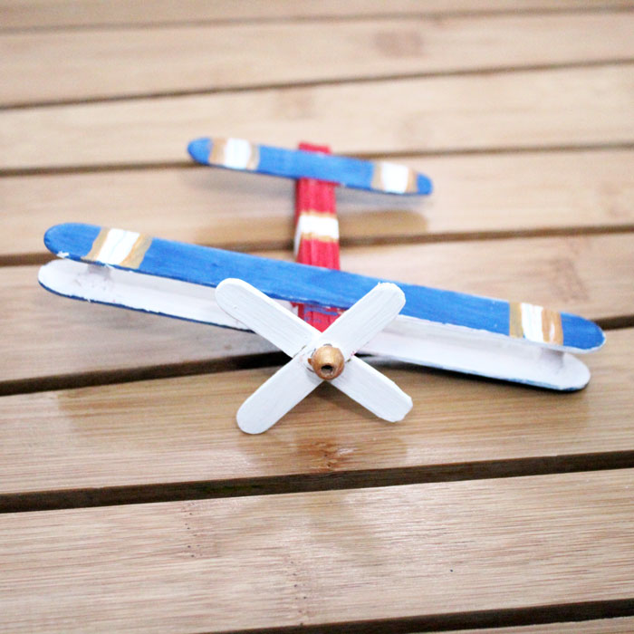 Make this super fun airplane craft - it works as a DIY wooden toy airplane too! I made it for my toddler but big kids can make it too :) It's an adorable flight and travel themed craft for kids