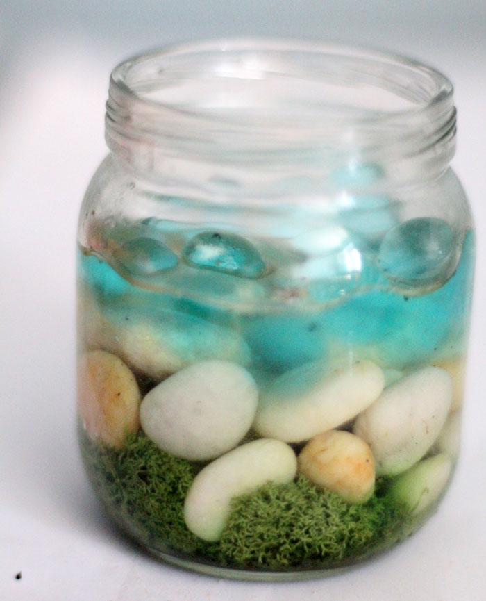 Have a favorite seashell? Make this beautiful beach-in-a-jar seashell keepsake craft to display! It's a great summer sea-inspired centerpiece, or just-for-fun idea for kids, adults, and teens!