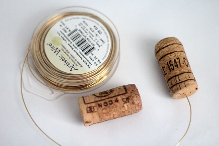 I'm always looking for ways to recycle wine corks and this DIY cork necklace craft is so easy and pretty! It's a beginner jewelry making craft, cheap, and great for teens too!