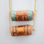 I'm always looking for ways to recycle wine corks and this DIY cork necklace craft is so easy and pretty! It's a beginner jewelry making craft, cheap, and great for teens too!