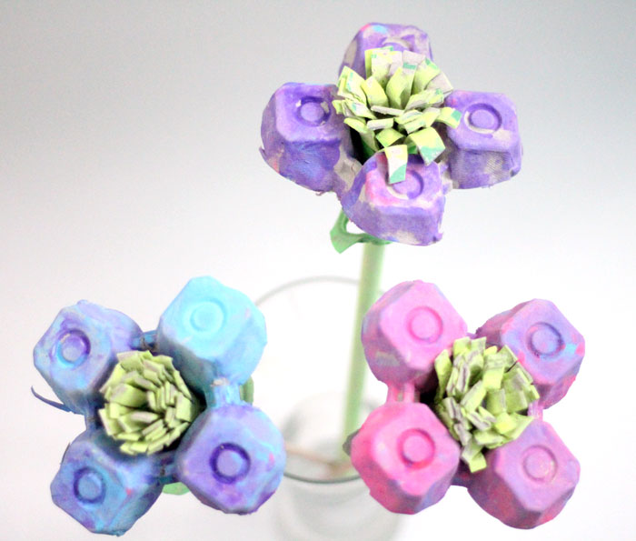 I made these beautiful egg carton flowers as a collaborative craft with my toddler! He had so much fun and is so proud of them! If you're looking for a pretty flower kids craft made fro upcycled materials, this is definitely one to try!