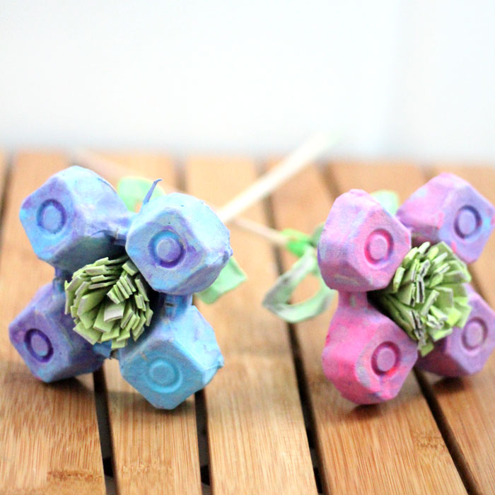 I made these beautiful egg carton flowers as a collaborative craft with my toddler! He had so much fun and is so proud of them! If you're looking for a pretty flower kids craft made fro upcycled materials, this is definitely one to try!