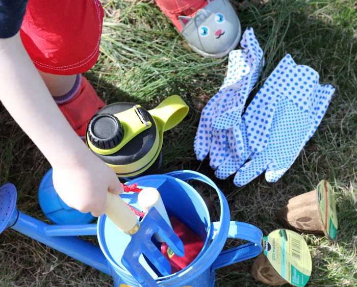 Plant a salad with your toddler - a fun outdoor gardening activity to get those little hands dirty! Plus, it encourages healthy eating, is educational, and is a perfect addition to your repertoire of toddler activities for the Spring or summer!