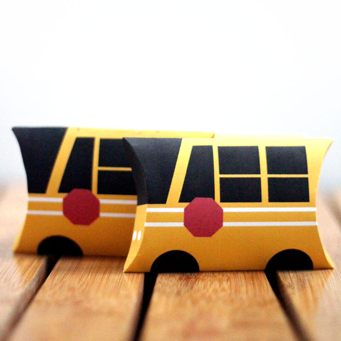 Grab these free printable school bus treat boxes for free! They include pillow box and a 3D bus that also makes a great toy. Perfect for back to school parties, transportation themed birthday party, or even as a gift box to thank a bus driver before school ends!