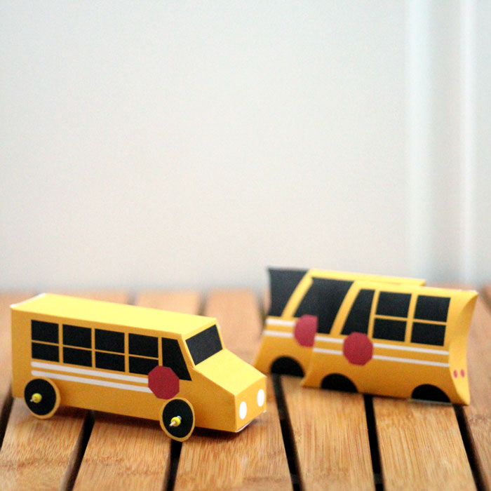 Grab these free printable school bus treat boxes for free! They include pillow box and a 3D bus that also makes a great toy. Perfect for back to school parties, transportation themed birthday party, or even as a gift box to thank a bus driver before school ends!