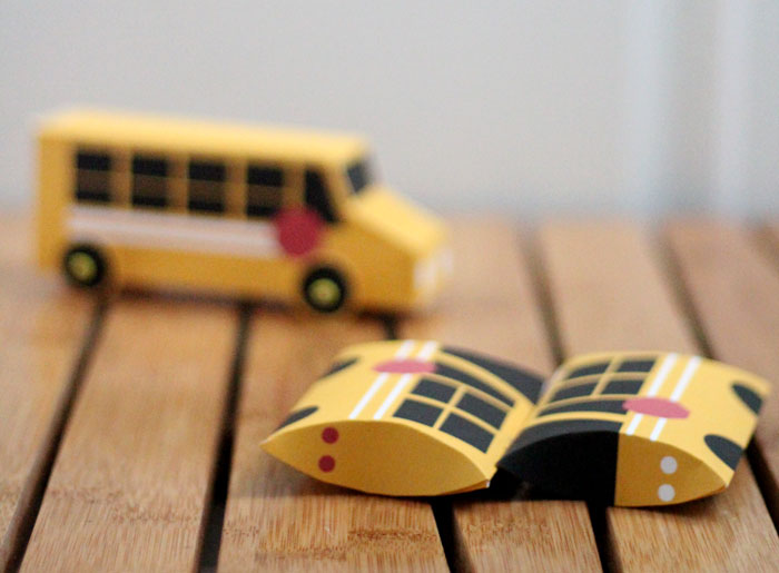 Grab these free printable school bus treat boxes for free! They include pillow box and a 3D bus that also makes a great toy. Perfect for back to school parties, transportation themed birthday party, or even as a gift box to thank a bus driver before school ends!