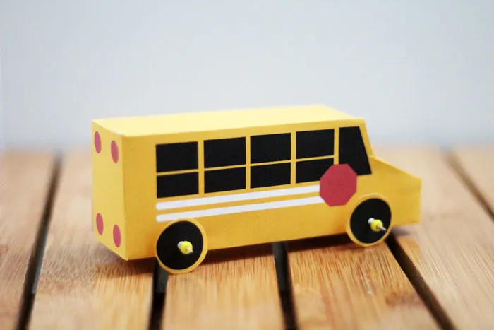 Grab these free printable school bus treat boxes for free! They include pillow box and a 3D bus that also makes a great toy. Perfect for back to school parties, transportation themed birthday party, or even as a gift box to thank a bus driver before school ends!