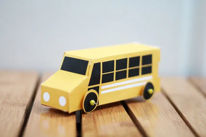 Grab these free printable school bus treat boxes for free! They include pillow box and a 3D bus that also makes a great toy. Perfect for back to school parties, transportation themed birthday party, or even as a gift box to thank a bus driver before school ends!