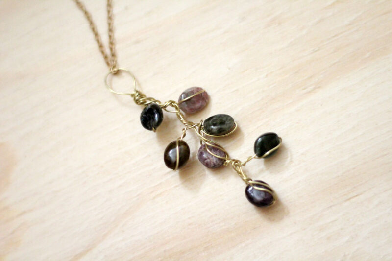 This stunning branch necklace is cheaper and easier to make than you might think! It's a great beginner wire wrapping jewelry making tutorial, and is a great autumn craft or DIY gift idea for the holidays!