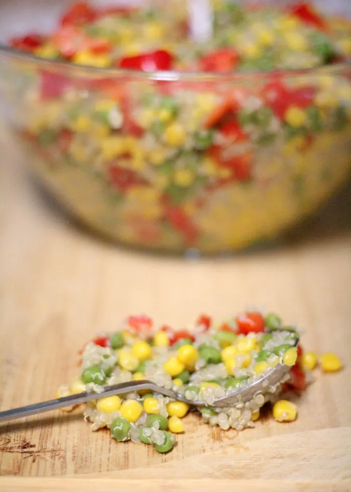 I love keeping a bowl of this easy and healthy garden quinoa salad recipe in the fridge! It's a great no-heat full meal with protein and vegetables - plus it's so colorful and pretty! Perfect for breastfeeding moms (I keep it handy while nursing)