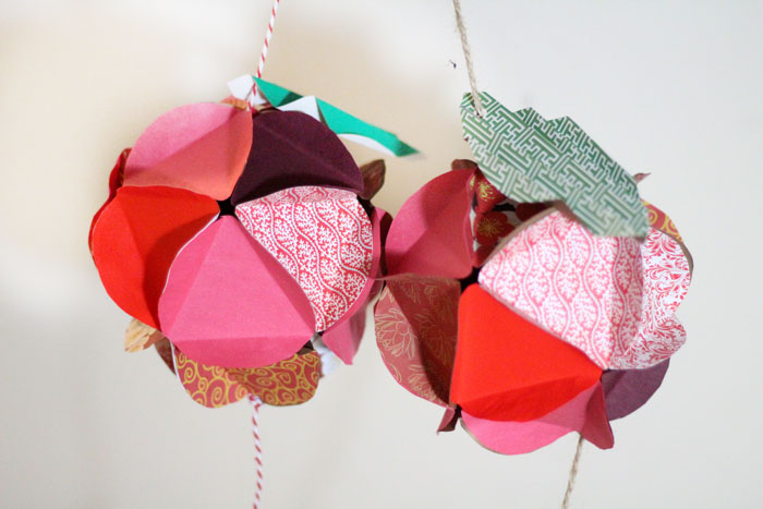 Make a beautiful apple paper globe to decroate your party or home! It's also a great sukkah decoration or rosh hashanah craft - for the Jewish High Holidays. This makes a perfect paper craft for teens and it's easy to adapt into anything.