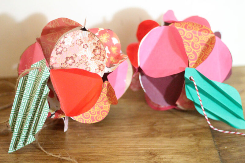 Make a beautiful apple paper globe to decroate your party or home! It's also a great sukkah decoration or rosh hashanah craft - for the Jewish High Holidays. This makes a perfect paper craft for teens and it's easy to adapt into anything.