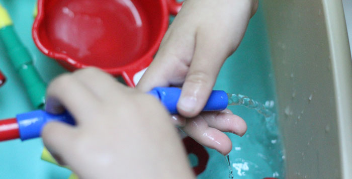 Check out this cool pipes and water play for toddlers activity - a fun sensory soup activity for toddler but also perfect for preschool and young kids! It incorpirates some engineering, problems solving, fine motor skills, plus some plain old silly fun!