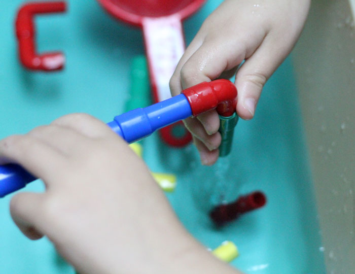 Check out this cool pipes and water play for toddlers activity - a fun sensory soup activity for toddler but also perfect for preschool and young kids! It incorpirates some engineering, problems solving, fine motor skills, plus some plain old silly fun!