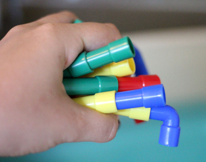 Check out this cool pipes and water play for toddlers activity - a fun sensory soup activity for toddler but also perfect for preschool and young kids! It incorpirates some engineering, problems solving, fine motor skills, plus some plain old silly fun!