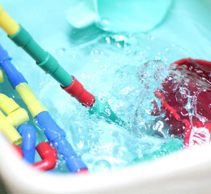 Check out this cool pipes and water play for toddlers activity - a fun sensory soup activity for toddler but also perfect for preschool and young kids! It incorpirates some engineering, problems solving, fine motor skills, plus some plain old silly fun!