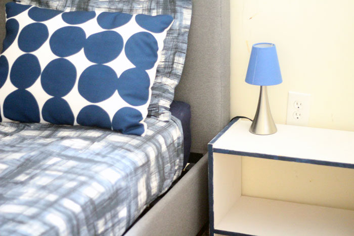 This IKEA RAST night stand makeover is so easy! The DIY color accent nightstand really pulls together the entire bedroom - which was remade on a shoestring. You'll love these budget-friendly bedroomd decor ideas and this easy IKEA RAST hack that can be done during naptime.