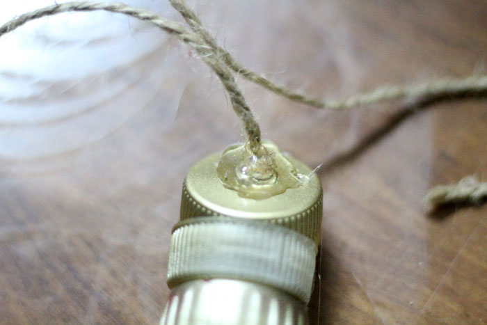 turn your recycling bin into a fun toy! Make a bottle cap rattlesnake craft for your little ones to play with - it actually rattles! This upcycled craft is a fun way to use up your bottle caps and a cute DIY toy idea.