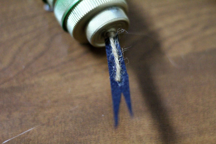 turn your recycling bin into a fun toy! Make a bottle cap rattlesnake craft for your little ones to play with - it actually rattles! This upcycled craft is a fun way to use up your bottle caps and a cute DIY toy idea.