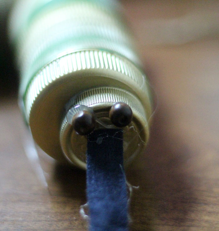 turn your recycling bin into a fun toy! Make a bottle cap rattlesnake craft for your little ones to play with - it actually rattles! This upcycled craft is a fun way to use up your bottle caps and a cute DIY toy idea.