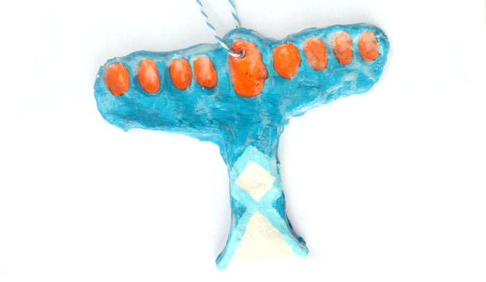 Make this fun Hanukkah craft for kids - a beautiful fingerprint menorah keepsake made using clay! This air dry clay craft for Chanukah is open-ended and perfect for toddlers, preschoolers, and kids. The final result can range from kid-made to professional looking!