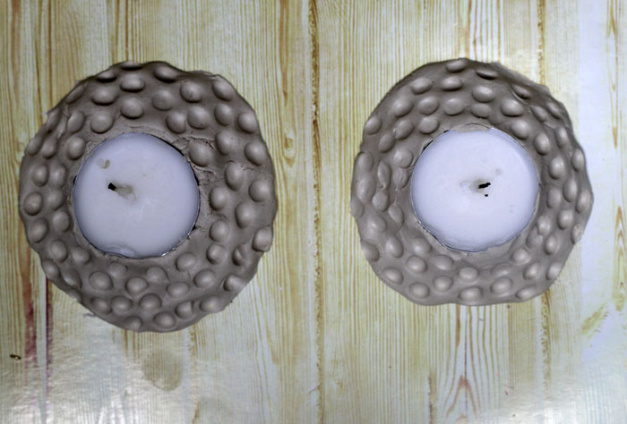 These beautiful faux hammered metal candle holders are stunning - and so easy to make! You don't need to be a pro to give this easy craft and DIY gift idea a whirl. Make DIY clay candle holders using a very specific clay that will work for this craft idea.