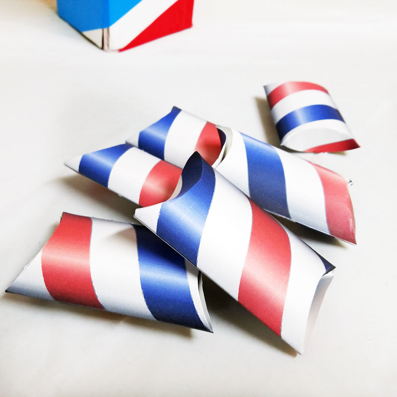 If you're throwing a barber shop themed or haircut party, or even a mustache bash, you may want to check out these free printable barber shop treat boxes - you can just print these favor boxes and they are easy to assemble and fill with inexpensive candy or favors. The fun red white and blue pillow boxes are also patriotic and great for Independence Day