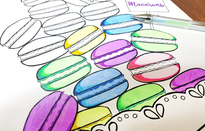 Free Printable coloring pages for adults - get this free food coloring page download for grown-ups! Color these macarons using pretty pastels or however you like them - whatever you do, just don't topple the pile! these are a great activity at a French themed event or to frame and hang as DIY kitchen decor.