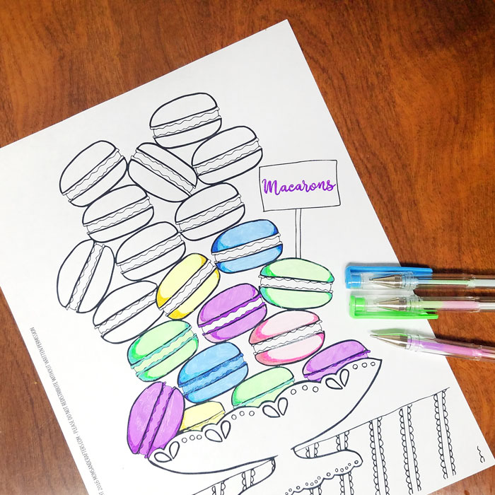 Free Printable coloring pages for adults - get this free food coloring page download for grown-ups! Color these macarons using pretty pastels or however you like them - whatever you do, just don't topple the pile! these are a great activity at a French themed event or to frame and hang as DIY kitchen decor.