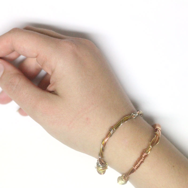 This beautiful wire wrapped bangle is perfect for stacking, for day or evening! I even wear mine alone and get so many compliments - just follow the simple step by step jewelry making tutorial including a video as well. This DIY jewelry making project is perfect for beginners or intermediate level