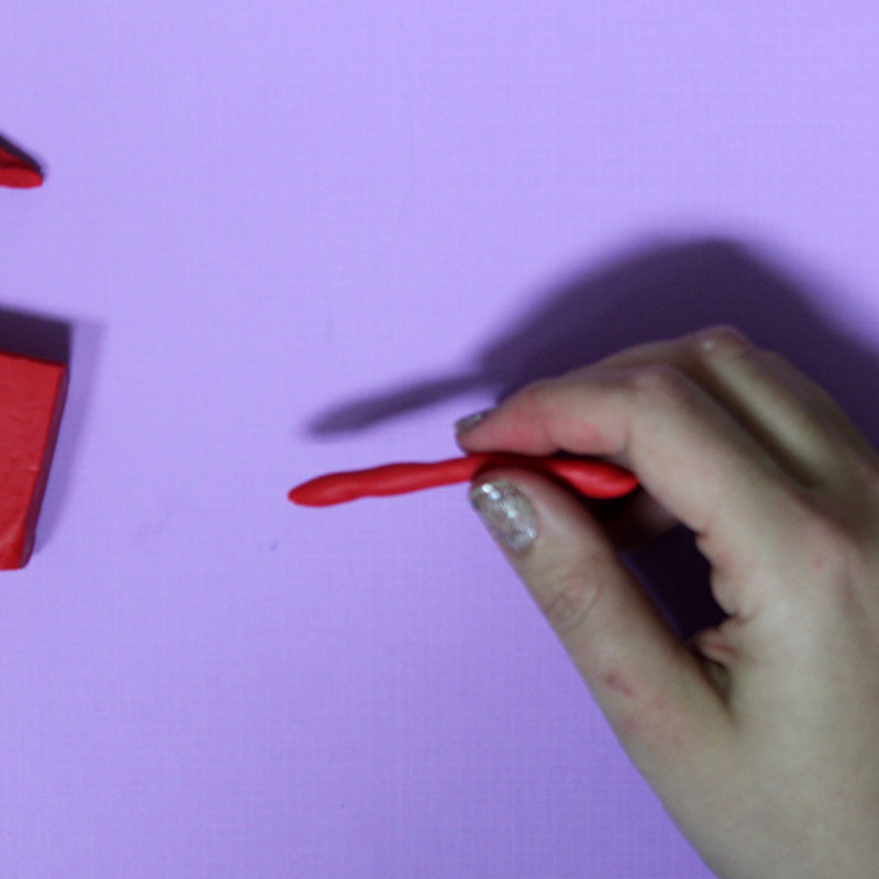 Make these fun DIY alphabet magnets using clay - love this DIY gift idea for young children! IT's a great way to teach the abc's and perfect for preschoolers. The glossy finish makes it look great.