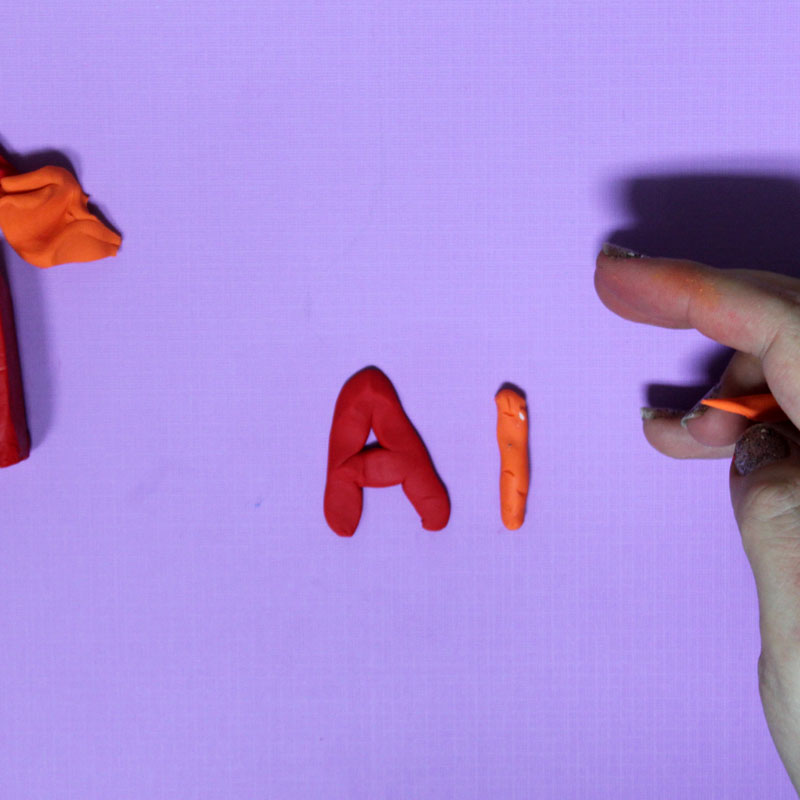 Make these fun DIY alphabet magnets using clay - love this DIY gift idea for young children! IT's a great way to teach the abc's and perfect for preschoolers. The glossy finish makes it look great.