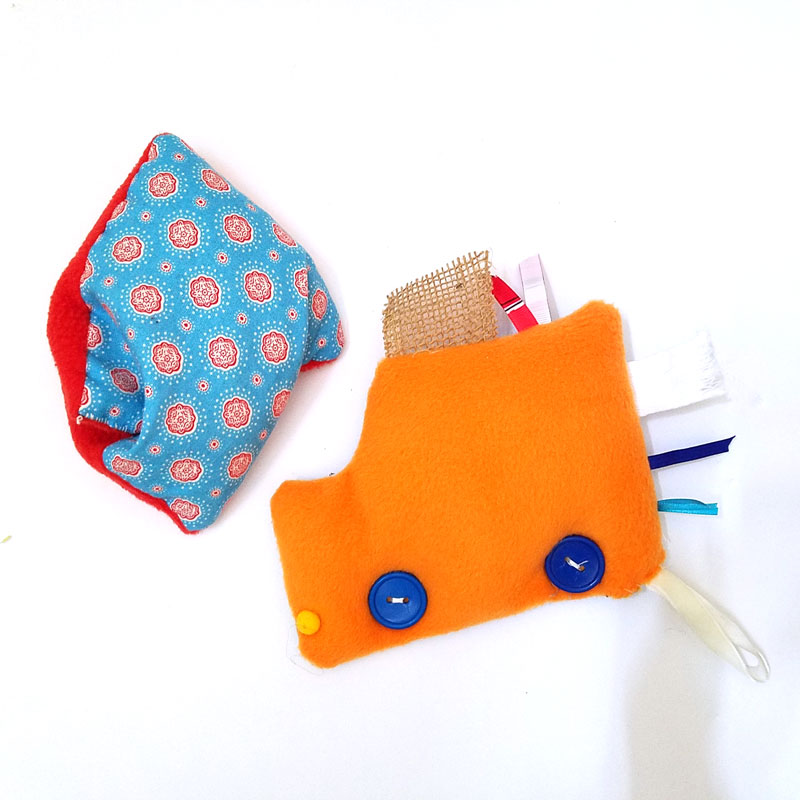 This easy DIY sensory toy is a fun beginner sewing project and DIY toy for toddlers and preschoolers. It's a weighted toy to help children with SPD, autism, or typical sensory input needs calm down, and an amazing easy calming tool for moms to create. You'll love this simple sewing craft for moms.