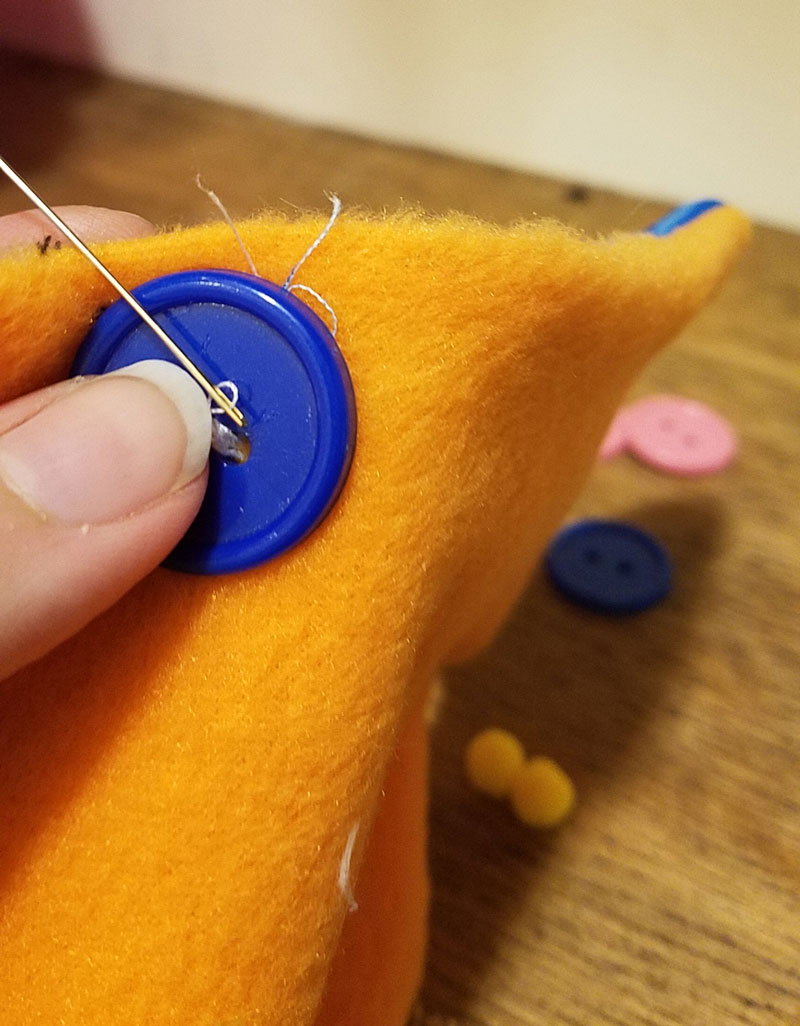 This easy DIY sensory toy is a fun beginner sewing project and DIY toy for toddlers and preschoolers. It's a weighted toy to help children with SPD, autism, or typical sensory input needs calm down, and an amazing easy calming tool for moms to create. You'll love this simple sewing craft for moms.