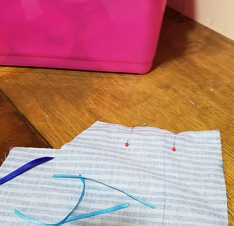 This easy DIY sensory toy is a fun beginner sewing project and DIY toy for toddlers and preschoolers. It's a weighted toy to help children with SPD, autism, or typical sensory input needs calm down, and an amazing easy calming tool for moms to create. You'll love this simple sewing craft for moms.