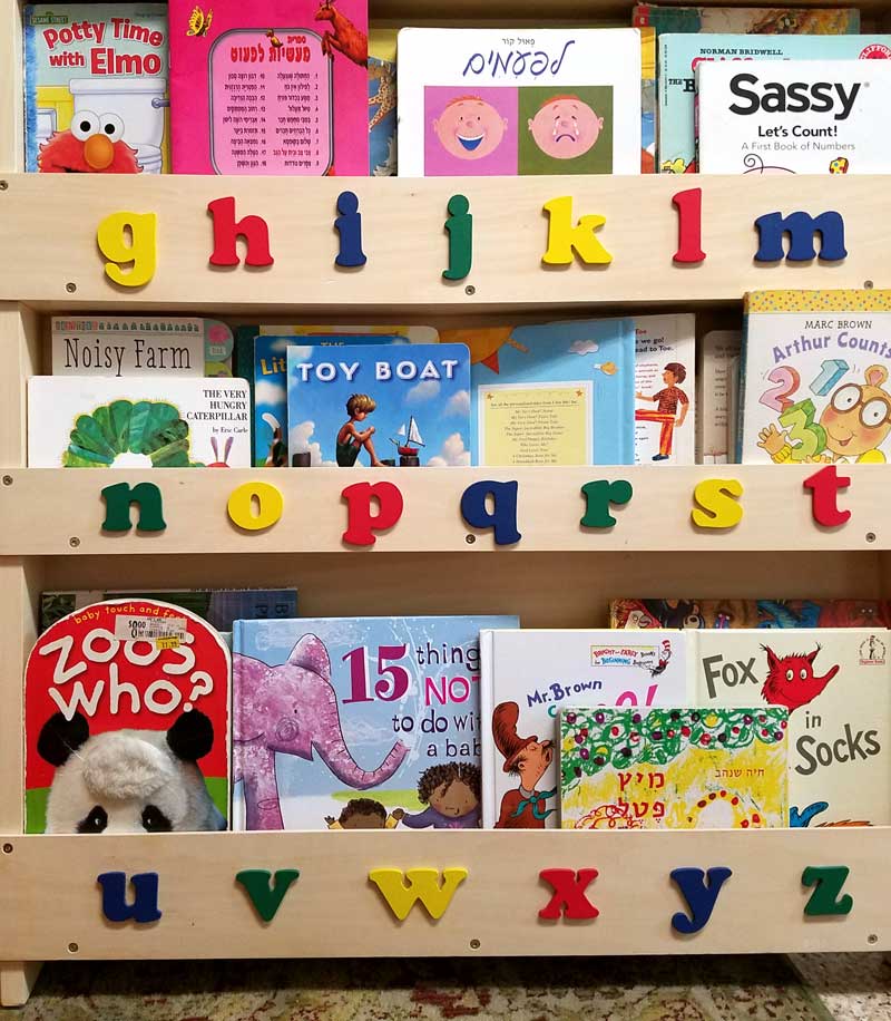These adorable, beautiful and practical kids book storage hacks and solutions will help you with your playroom organization, while encouraging kids to read!