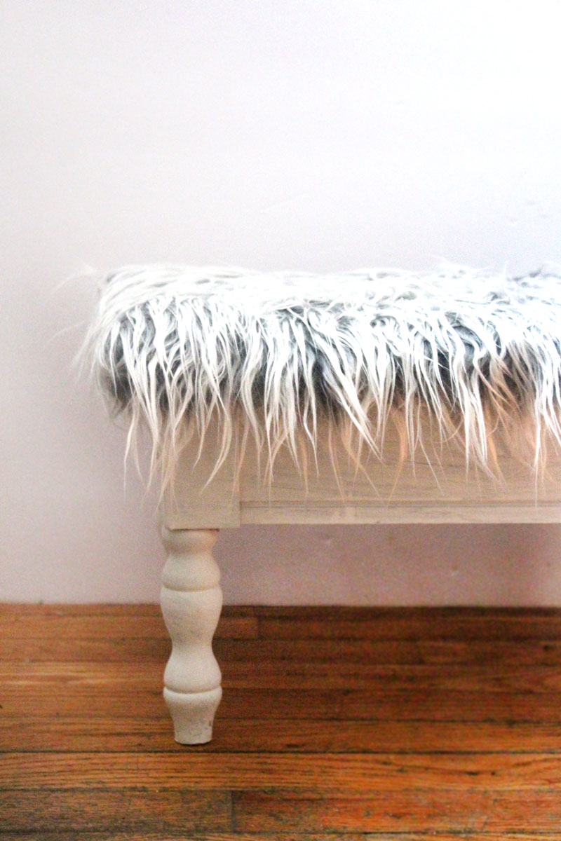 I love this DIY faux fur stool makeover from a flea market find! This ugly vintage sewing stool is transformed into beautiful DIY home decor for the craft room in under half an hour!