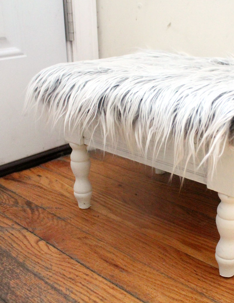 I love this DIY faux fur stool makeover from a flea market find! This ugly vintage sewing stool is transformed into beautiful DIY home decor for the craft room in under half an hour!