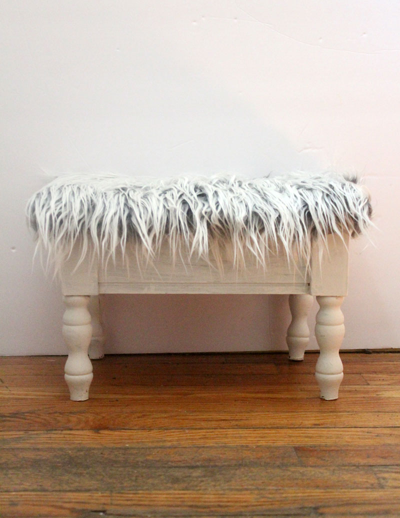 I love this DIY faux fur stool makeover from a flea market find! This ugly vintage sewing stool is transformed into beautiful DIY home decor for the craft room in under half an hour!