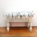 I love this DIY faux fur stool makeover from a flea market find! This ugly vintage sewing stool is transformed into beautiful DIY home decor for the craft room in under half an hour!