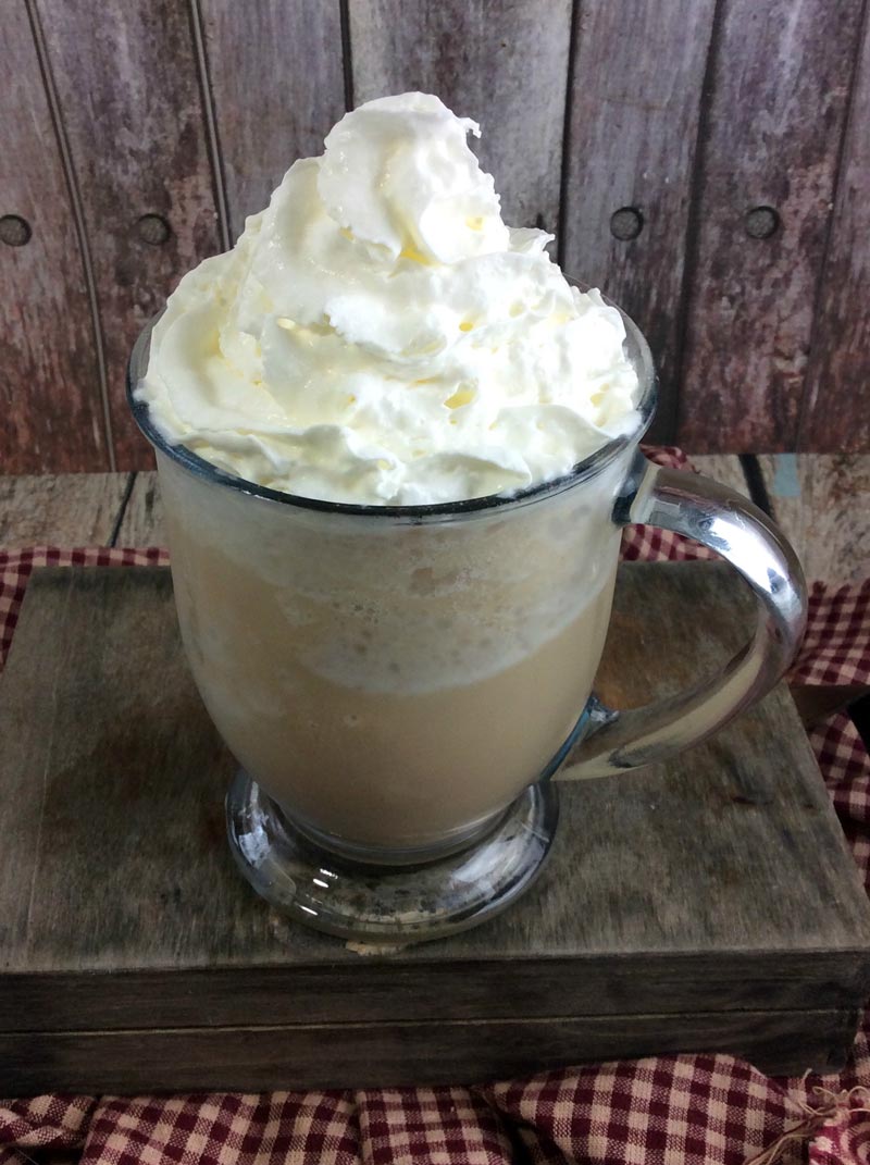 Treat yourself to this heavenly smoked butterscotch latte, inspired by the Starbucks drink - you'll love relaxing over this heavenly Starbucks knock off recipe! IT takes minutes to put together this easy coffee drink recipe and it's perfect for a cold winter day (drink warm) or a hot summer day (drink cold).