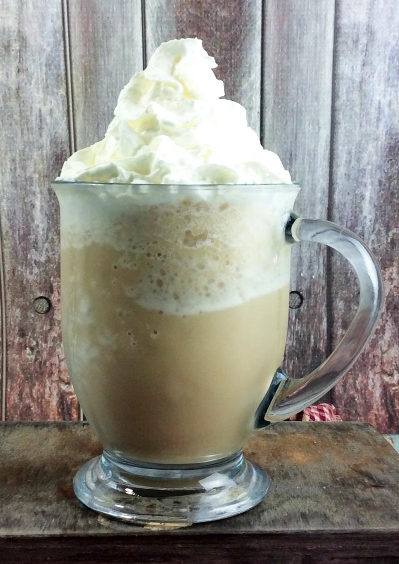 Treat yourself to this heavenly smoked butterscotch latte, inspired by the Starbucks drink - you'll love relaxing over this heavenly Starbucks knock off recipe! IT takes minutes to put together this easy coffee drink recipe and it's perfect for a cold winter day (drink warm) or a hot summer day (drink cold).