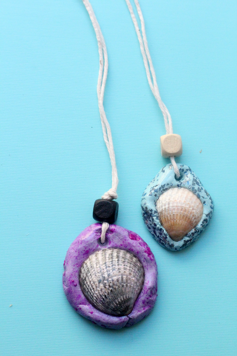 Make an easy DIY seashell necklace for your little mermaid - this easy jewelry making craft for kids is also a perfect summer camp activity for tweens and teens! It's made from air dry clay and a super cool glaze, with instructions for adding different textures to the clay.