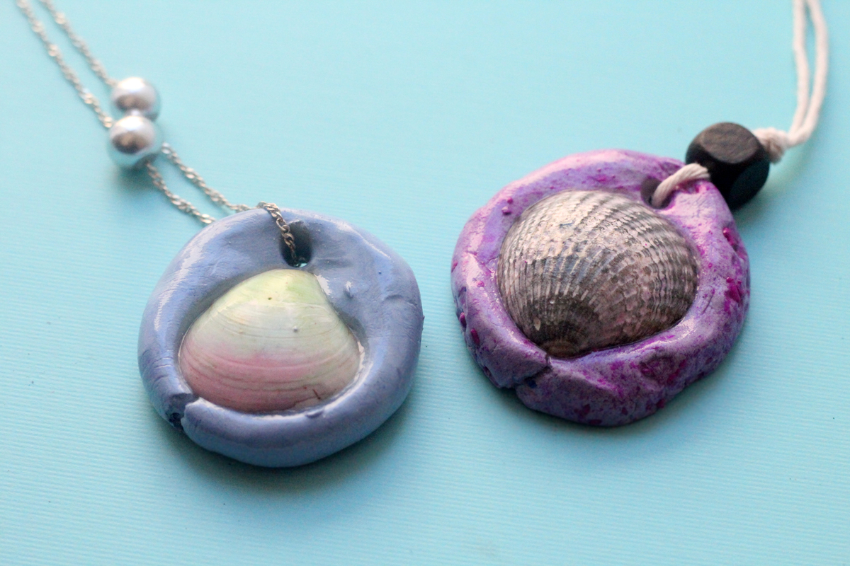 Make an easy DIY seashell necklace for your little mermaid - this easy jewelry making craft for kids is also a perfect summer camp activity for tweens and teens! It's made from air dry clay and a super cool glaze, with instructions for adding different textures to the clay.