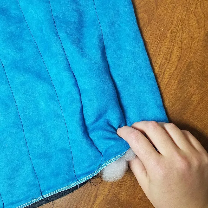 Make a DIY weighted lap pad - an easy beginner sewing project for moms! This calming sensory tool offers multi-sensory stimulation and is perfect for calming young children with anxiety. It's a DIY toy and a simple half-hour craft for moms all in one!