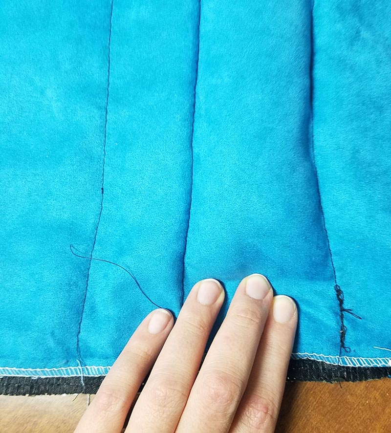 Make a DIY weighted lap pad - an easy beginner sewing project for moms! This calming sensory tool offers multi-sensory stimulation and is perfect for calming young children with anxiety. It's a DIY toy and a simple half-hour craft for moms all in one!