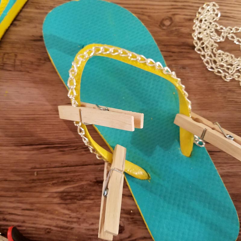 Make your cheap dollar store flip flops look super cool with these DIY flip flops - an easy summer camp craft for teens and tweens - or grown-ups too!